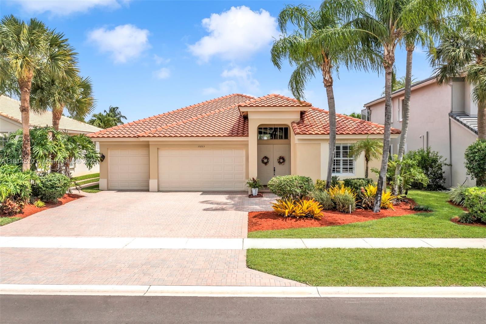 Experience this stunning, 4/3 lakefront home in the stunning, guard gated, safe haven community, The Isles at
Wellington. Nestled in the heart of the World Renowned, World Class Equestrian in Wellington. You'll say WOW the
moment you open the door! Long, wide open hallway and extremely high 14ft ceilings, open floor plan,
overlooking the tropical landscape, completely remodeled pool, jacuzzi & lake front view. Recent upgrades include
newer AC unit, pool and jacuzzi heater and stained tile grout(10 yr transferable warranty). Roofs about 10 yrs, in
great shape and no damage or repairs. Pool Features include a state of the art, completely renovated pool deck,
pool plaster, self cleaning pool,remote control/ automated system, mosaic design. Desired school district,World
class amenities.