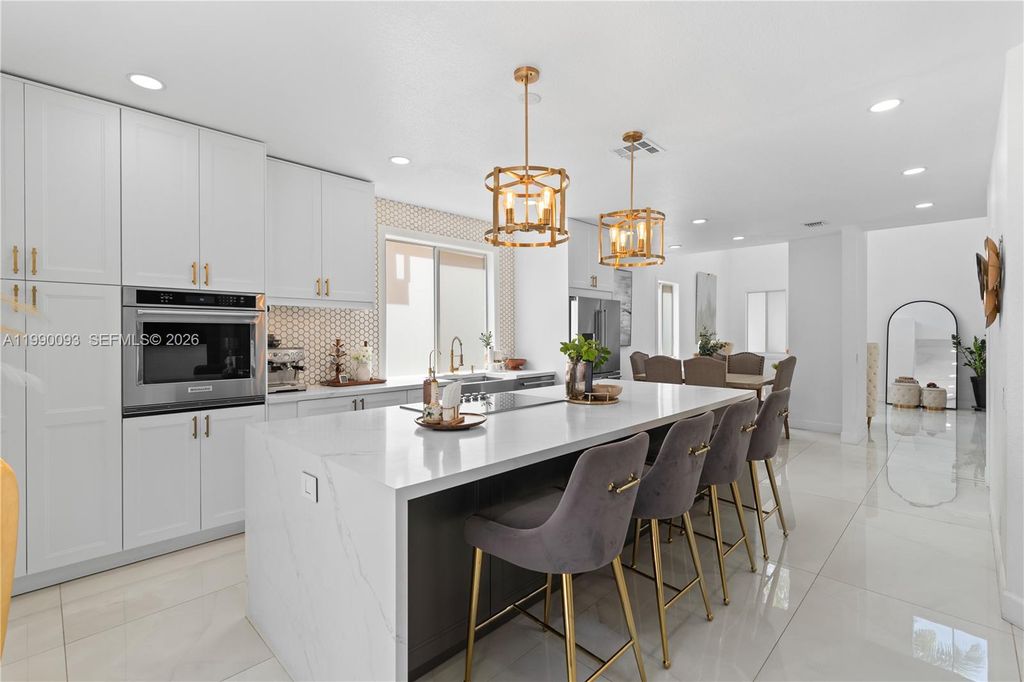 Photo of 1500 Canary Island Dr, Weston, FL 33327 (MLS # A11990093)