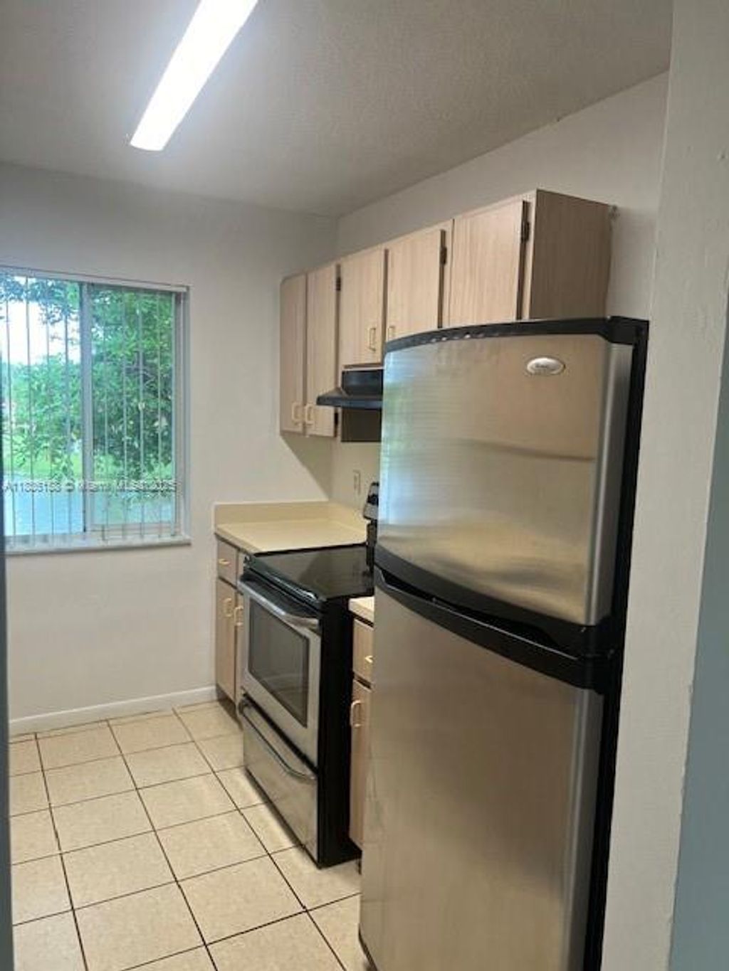 Photo of 10765 Cleary Blvd #202, Plantation, FL 33324 (MLS # A11836158)