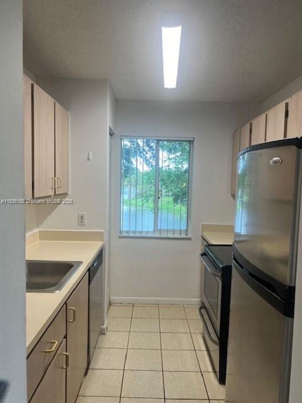 Photo of 10765 Cleary Blvd #202, Plantation, FL 33324 (MLS # A11836158)