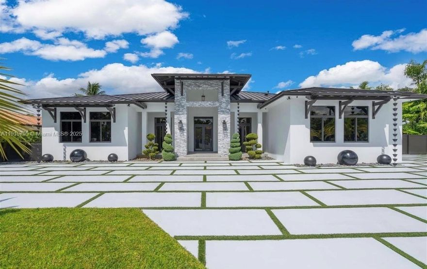 Beautiful, modern estate offering true resort-style living Enjoy a stunning LED-lit pool, luxury summer kitchen, lush tropical landscaping, hammocks, and expansive custom pavers throughout the outdoor areas. The property also includes a a fully independent guest house, perfect for extended stays or added flexibility. Gated, private, and designed with exceptional indoor/outdoor flow, this home delivers comfort, elegance, and a one-of-a-kind rental experience.