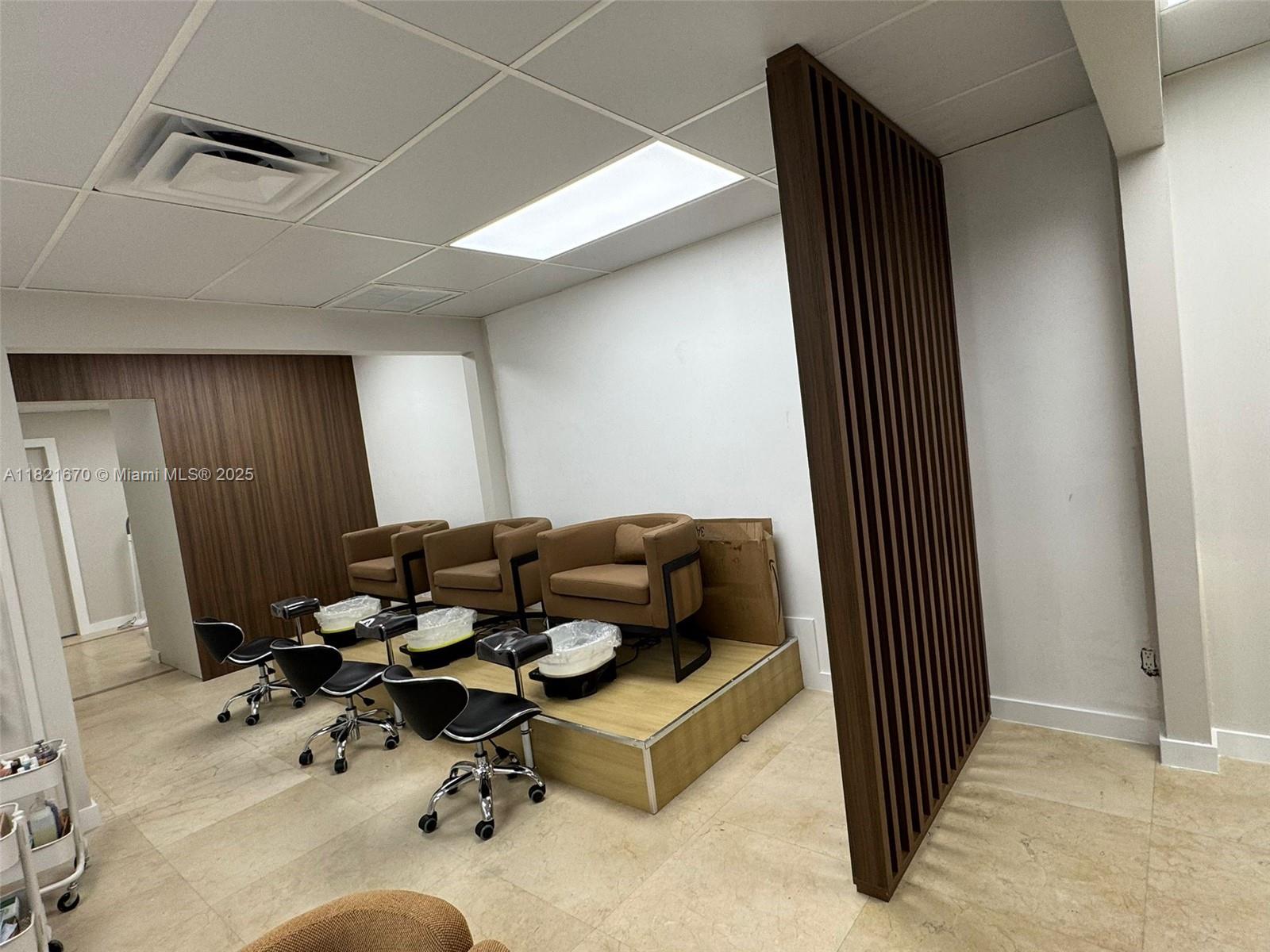 Nail salon for sale in Doral, FL, located in a busy plaza with high foot traffic and low rent. Features include 3 pedicure stations, 4 manicure stations, a reception area, private waxing room, kitchenette, and bathroom. Fully equipped and ready for immediate operation—perfect for an owner-operator or investor.