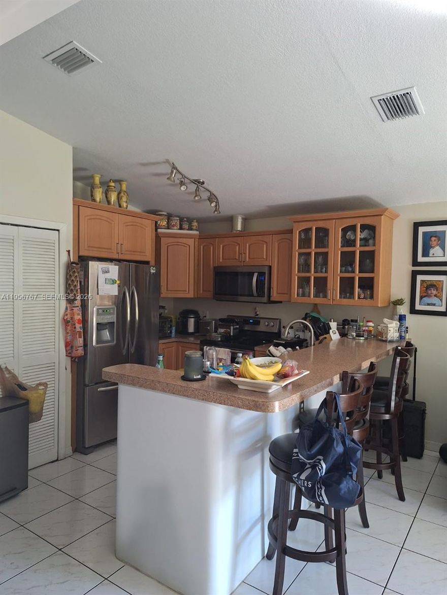 No Association fees. Central located on South West Kendall, close to expressway ramps. A comfortable 3 beds & 2 baths. Currently two beds converted to a guess house for income. Owner-agents
