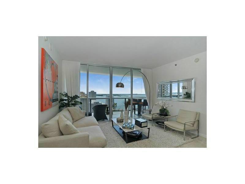 Contemporary 2/2 + den palace in the sky! Beautiful unit offers breathtaking panoramic views of Miami's most sought after sceneries including Biscayne Bay and Atlantic Ocean. This elegant condo is complete with marble flooring throughout and the finest fi nishes. Located in the Icon Brickell, a full service building designed by Philippe Starck. Fully Furnished bring your tooth brush