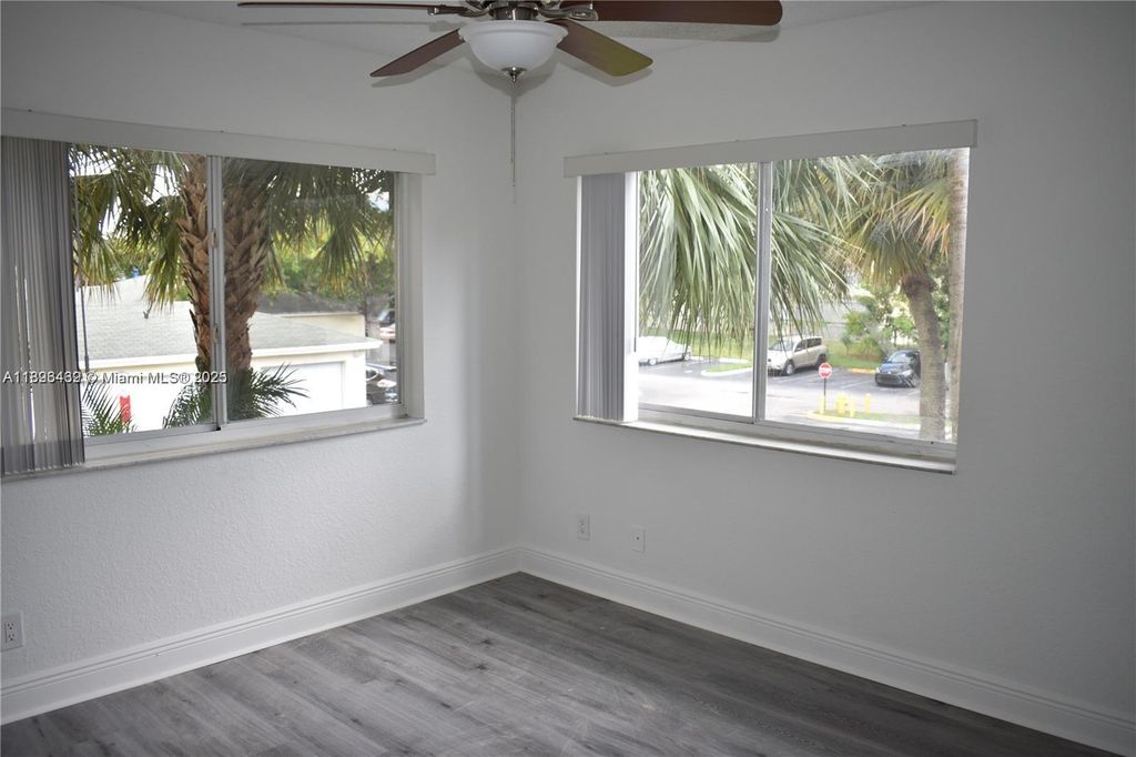 Photo of 5760 Rock Island Rd #320, Tamarac, FL 33319 (MLS # A11896439)