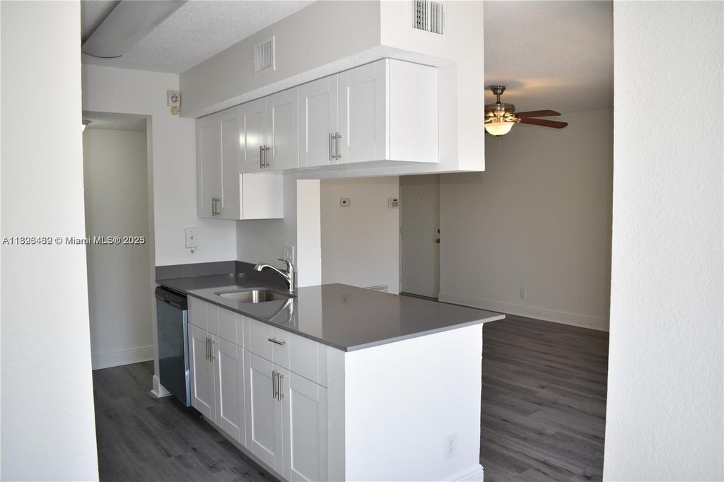 Photo of 5760 Rock Island Rd #320, Tamarac, FL 33319 (MLS # A11896439)