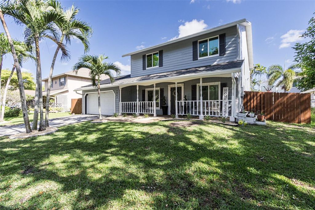 Photo of 7941 NW 3rd Pl, Plantation, FL 33324 (MLS # A12003611)