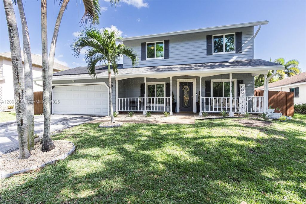 Photo of 7941 NW 3rd Pl, Plantation, FL 33324 (MLS # A12003611)