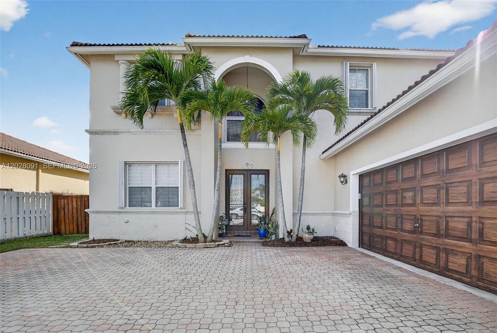 Photo of 19018 NW 23rd Pl, Pembroke Pines, FL 33029 (MLS # A12028091)