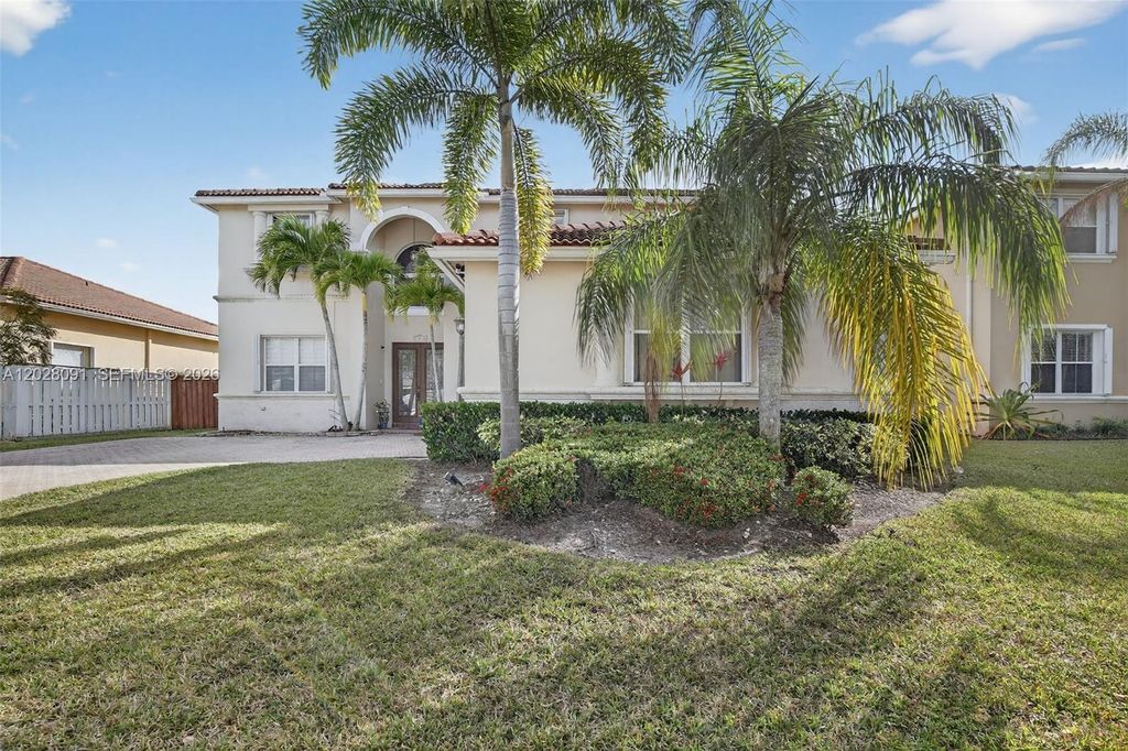 Photo of 19018 NW 23rd Pl, Pembroke Pines, FL 33029 (MLS # A12028091)