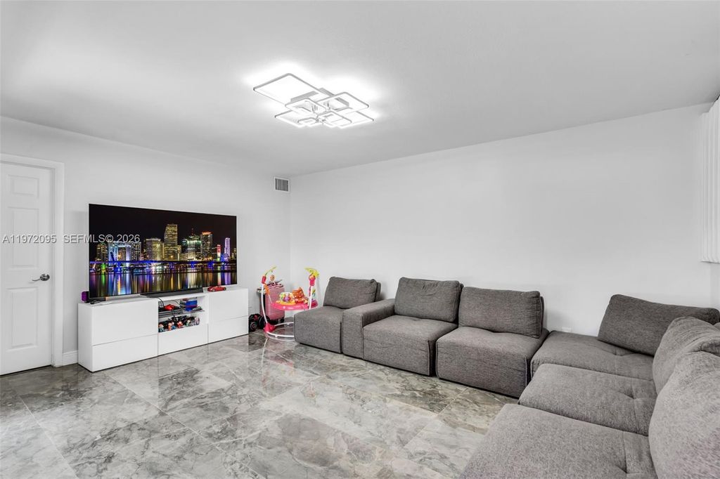 Photo of 11903 SW 11th Ct, Davie, FL 33325 (MLS # A11972095)