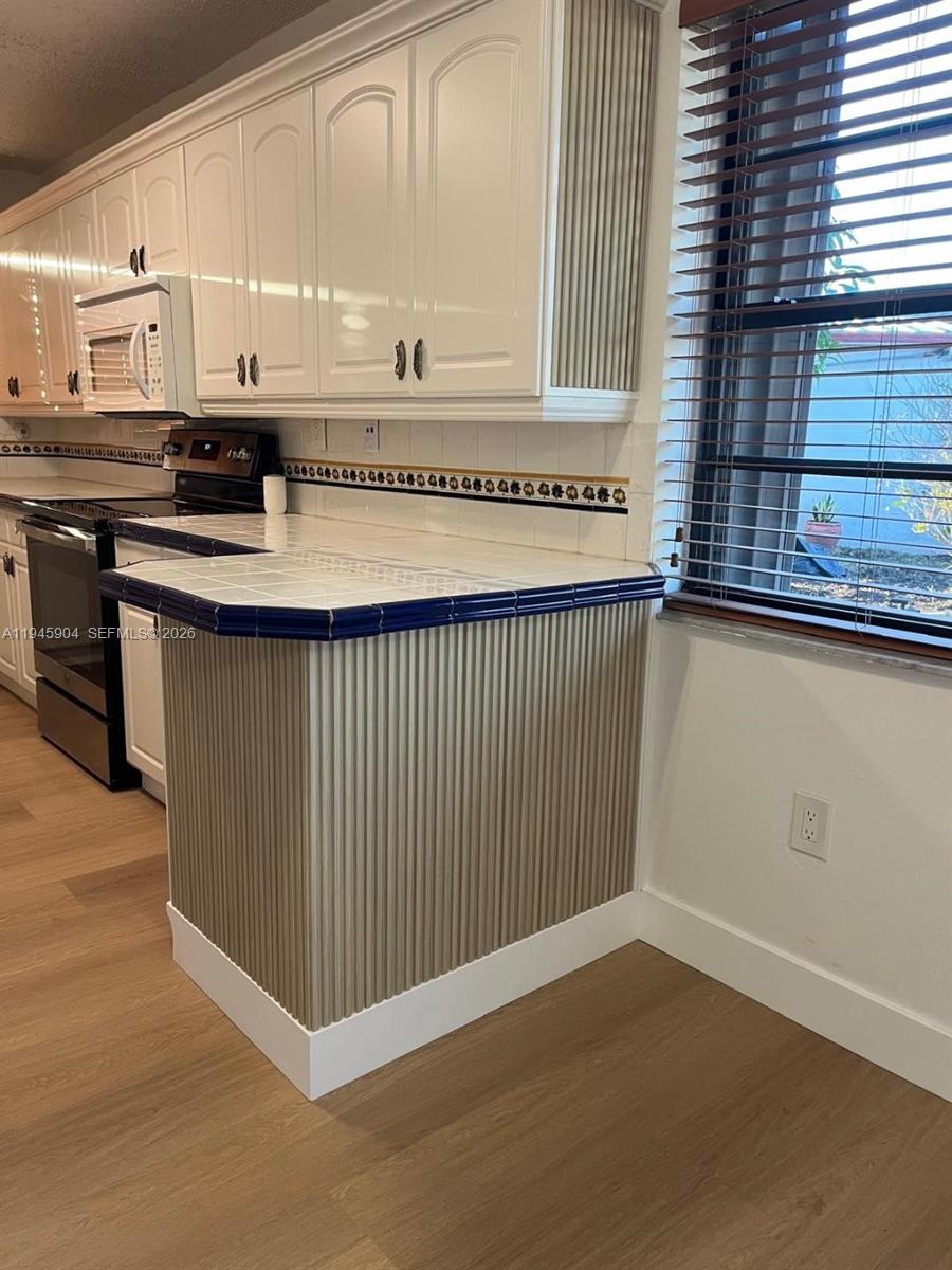 LAKES N GARDENS CONDO #50 - Residential Lease