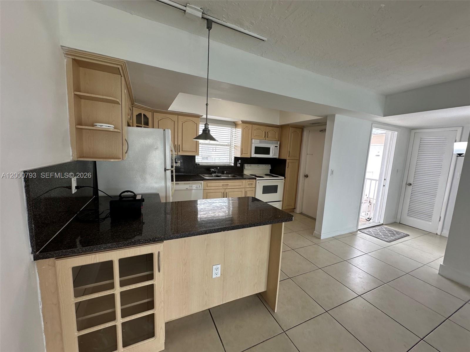 VILLAGE AT DADELAND CONDO - Residential