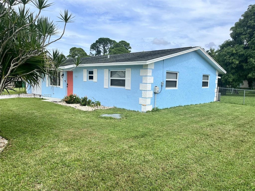 Photo of 977 SW Sarto Ln, Port Saint Lucie, FL 34953 (MLS # A11491139)