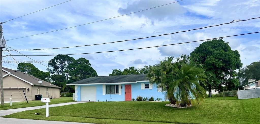 Photo of 977 SW Sarto Ln, Port Saint Lucie, FL 34953 (MLS # A11491139)