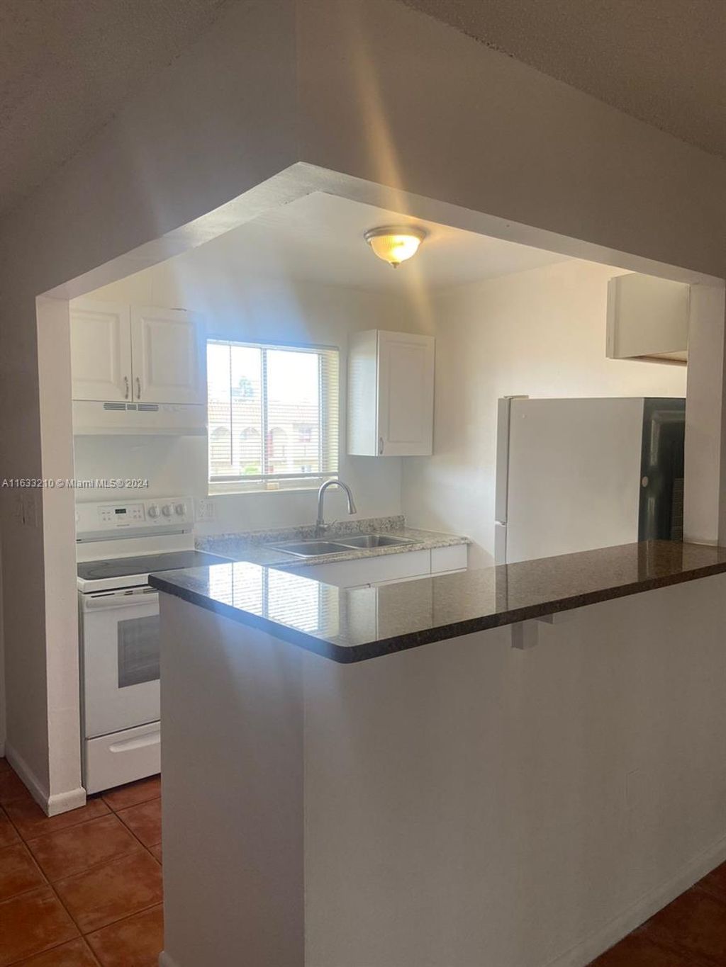 Photo of 6094 Forest Hill Blvd #201, West Palm Beach, FL 33415 (MLS # A11633210)