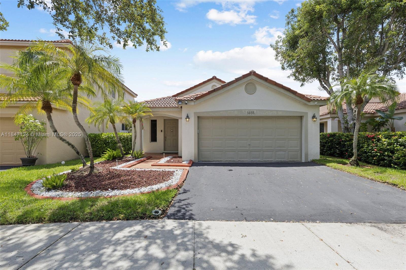 Welcome to this stunning, upgraded home located in the desirable community of San Sebastián in Weston. This beautifully maintained property features spacious living areas, 3 bedrooms, 2 bathrooms, 2 car garage, a modern kitchen with high-end appliances, and a serene backyard perfect for relaxation. Enjoy the community amenities, including a pool, playground, and top-rated schools nearby. Experience the superb blend of comfort and convenience in this wonderful neighborhood. The AC, water heater, washer, and dryer are all new as of 2024.