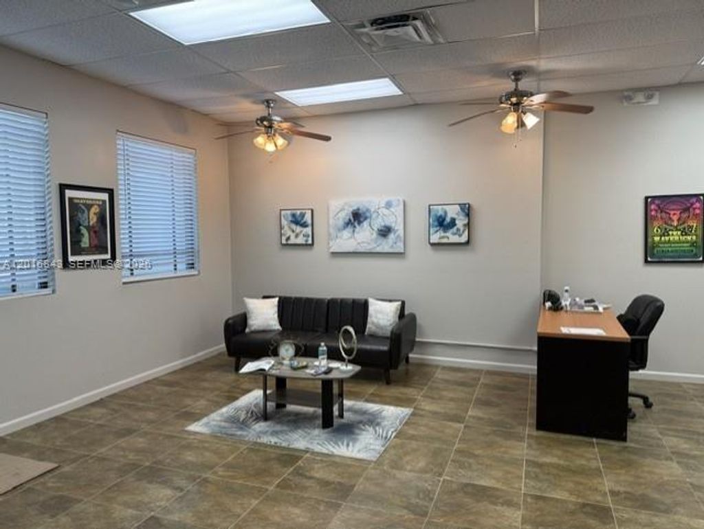 Photo of 10600 Griffin Rd #A-105, Cooper City, FL 33328 (MLS # A12016843)