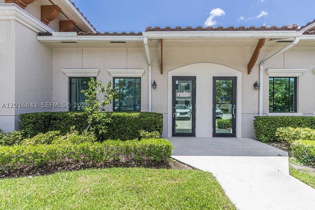 Photo of 10600 Griffin Rd #A-105, Cooper City, FL 33328 (MLS # A12016843)