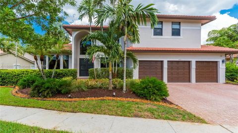 Photo of 1411 NW 179th Ave, Pembroke Pines, FL 33029 (MLS # A11866072)