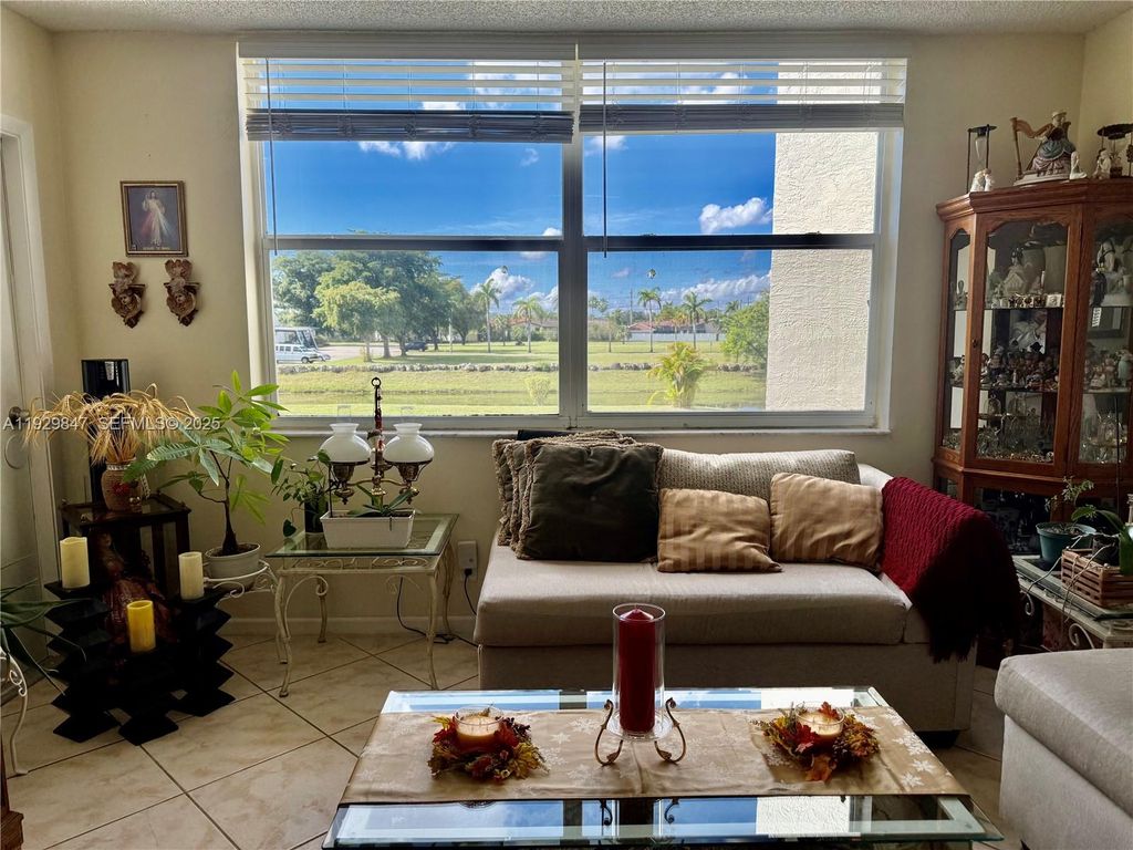 Photo of 6890 Royal Palm Blvd #208H, Margate, FL 33063 (MLS # A11929847)