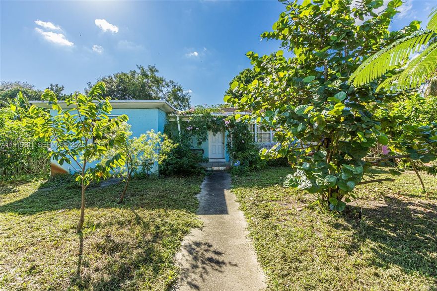 Discover a great opportunity to create the home or investment you’ve been envisioning in a fantastic North Miami location! With over 1,900 SF, this 4 BEDS & 3 BATHS (main house is a 3/2 PLUS SEPARATE 1/1 with its own private entrance) sits on a generous lot with a lovely butterfly garden and mature trees. The main home features spacious living areas, private master bedroom w/ in-suite bathroom, a galley kitchen with plenty of cabinets, great storage, and a newer fridge and stove. The additional 1/1 provides great flexibility—ideal for an in-law suite, home office, or as a rental for supplemental income. Ready to be reimagined, this property provides endless potential and is the perfect opportunity to bring your own vision and personal style to life. Centrally located near all the local shops and restaurants, and major highways. A wonderful chance. NO FLOOD INSURANCE REQUIRED. Easy to show.