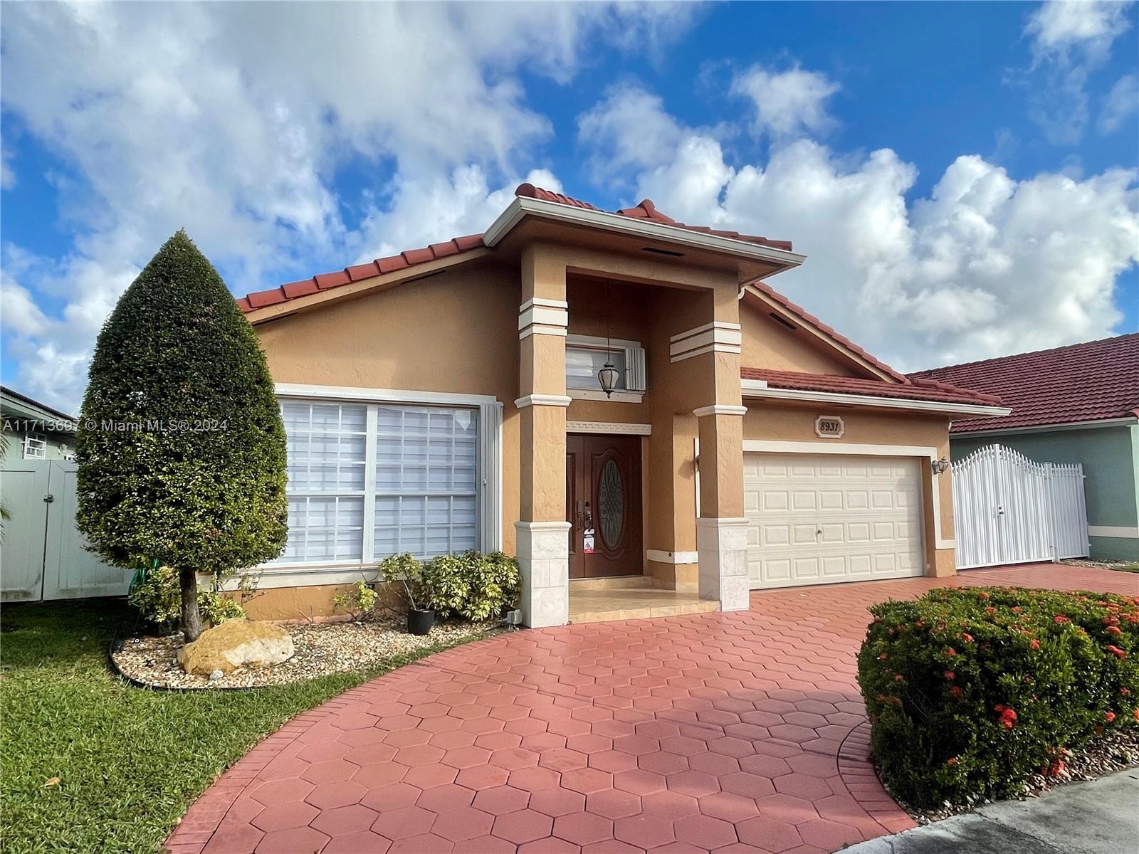 8931 Nw 148th Ter, Miami Lakes, Miami-Dade County, Florida - 4 Bedrooms  
2 Bathrooms - 