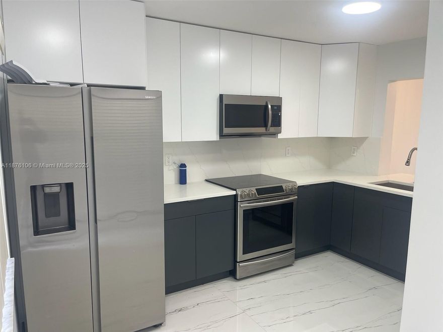 MUST SEE! Beautiful light, airy modern! remodeled kitchen, floors, bathrooms. Top quality kitchen European finish cabinets. First floor no stairs walkup with groceries, canal view. Listing agent will accompany for showing. Unit has hurricane shutters already installed including drop down patio shutters for extra privacy when desired. Community has license plate reader for safety, great amenities clubhouse, pool, gym, tennis courts, sports center, BBQ area, for residents of all ages. Additional utility storage closet, and large closets throughout unit. Conveniently located close to shopping , short ride to beach/pier . Association dues include water, sewer trash, insurance, roof, common area maintenance, including pool and clubhouse.