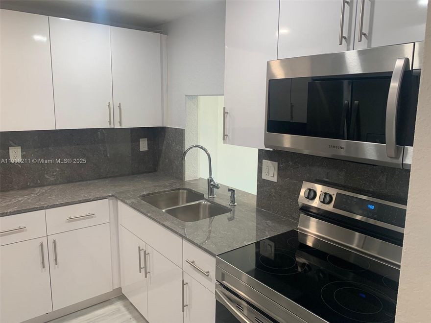 Nice unit completely updated. New flooring throughout. New kitchen cabinet, countertops, and appliances. Lots of closet space. Laundry room on same floor. 
Ready to move with fast approval.  Equal Housing opportunity.