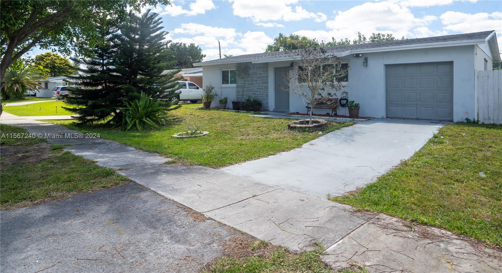 Property for Sale at 8000 Nw 174th Ter Ter, Hialeah, Miami-Dade County, Florida - Bedrooms: 4 
Bathrooms: 2  - $668,900