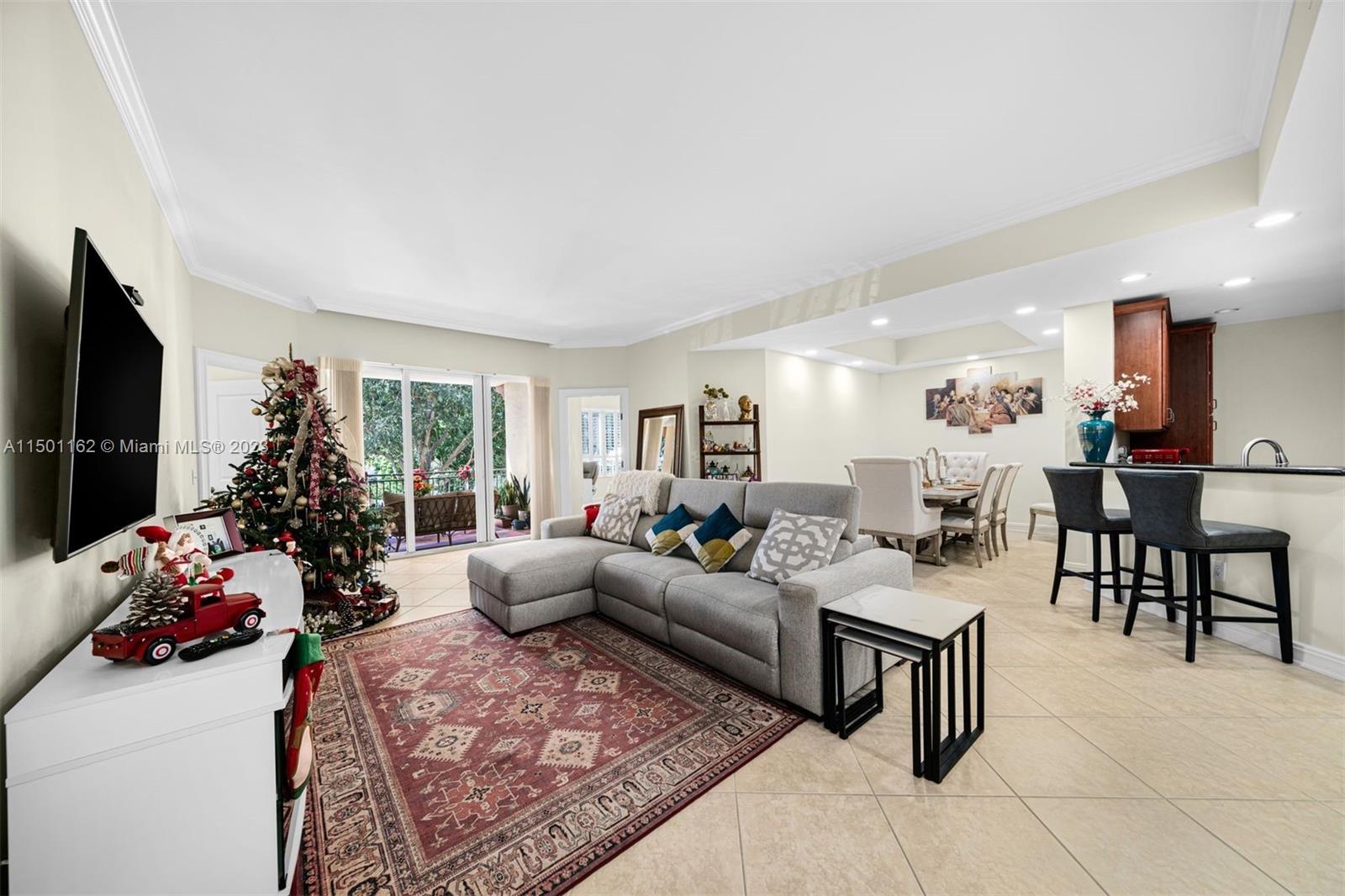 A stunning 2 Bed, 2.5 Bath condo w/ additional open den at The Palms at Weston - a fabulous 55+ community w/ a deluge of amenities. Main living area is adorned w/ neutral tile while the bedrooms have cozy carpeting, and elegant plantation shutters & crown molding enhance the living area's ambiance. The master suite boasts a huge walk-in closet w/ custom organizers, double vanity, whirlpool spa tub, and separate glass-enclosed shower. The kitchen features tons of cabinet space, granite countertops, S/S appliances, and pantry w/ custom pull-outs. The living area is spacious, complemented by a separate laundry room and an open patio offering partial water views.
Amenities include clubhouse, gym, valet parking, restaurant, card room, walking paths, heated pool w/ 2 spas, and much more.