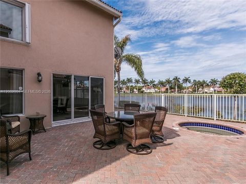 Photo of 1590 Seagrape Way, Hollywood, FL 33019 (MLS # A12002051)
