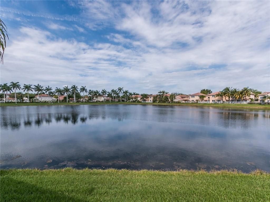 Photo of 1590 Seagrape Way, Hollywood, FL 33019 (MLS # A12002051)