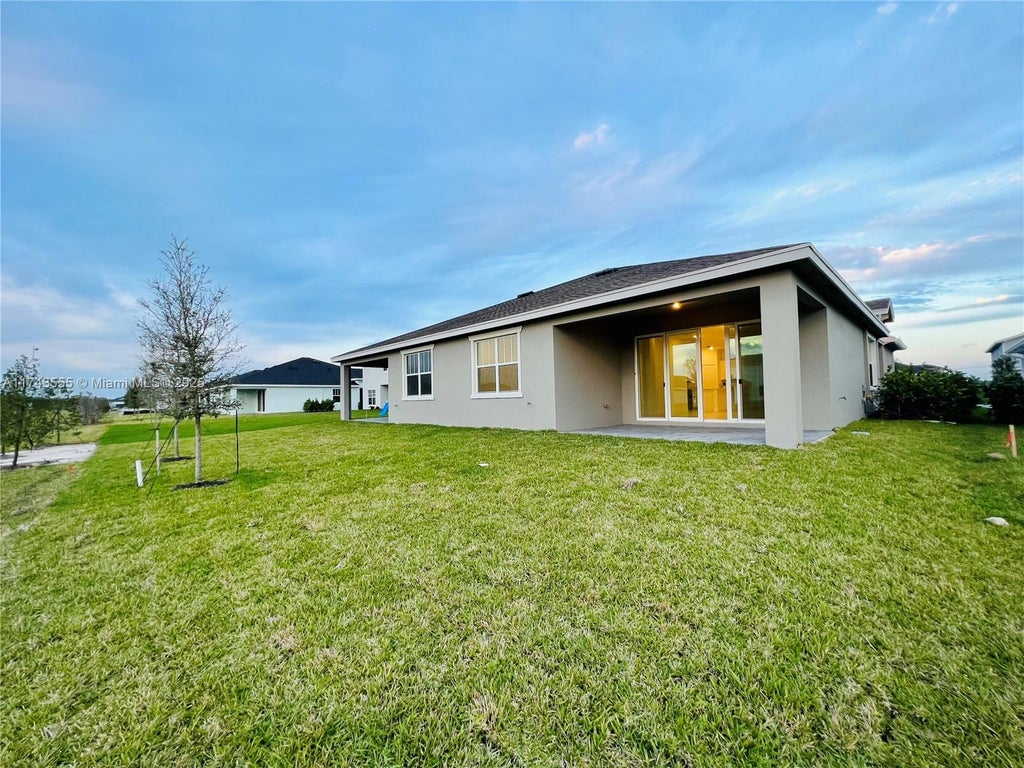 Photo of 1401 Haywagon Trl, Loxahatchee, FL 33470 (MLS # A11743555)