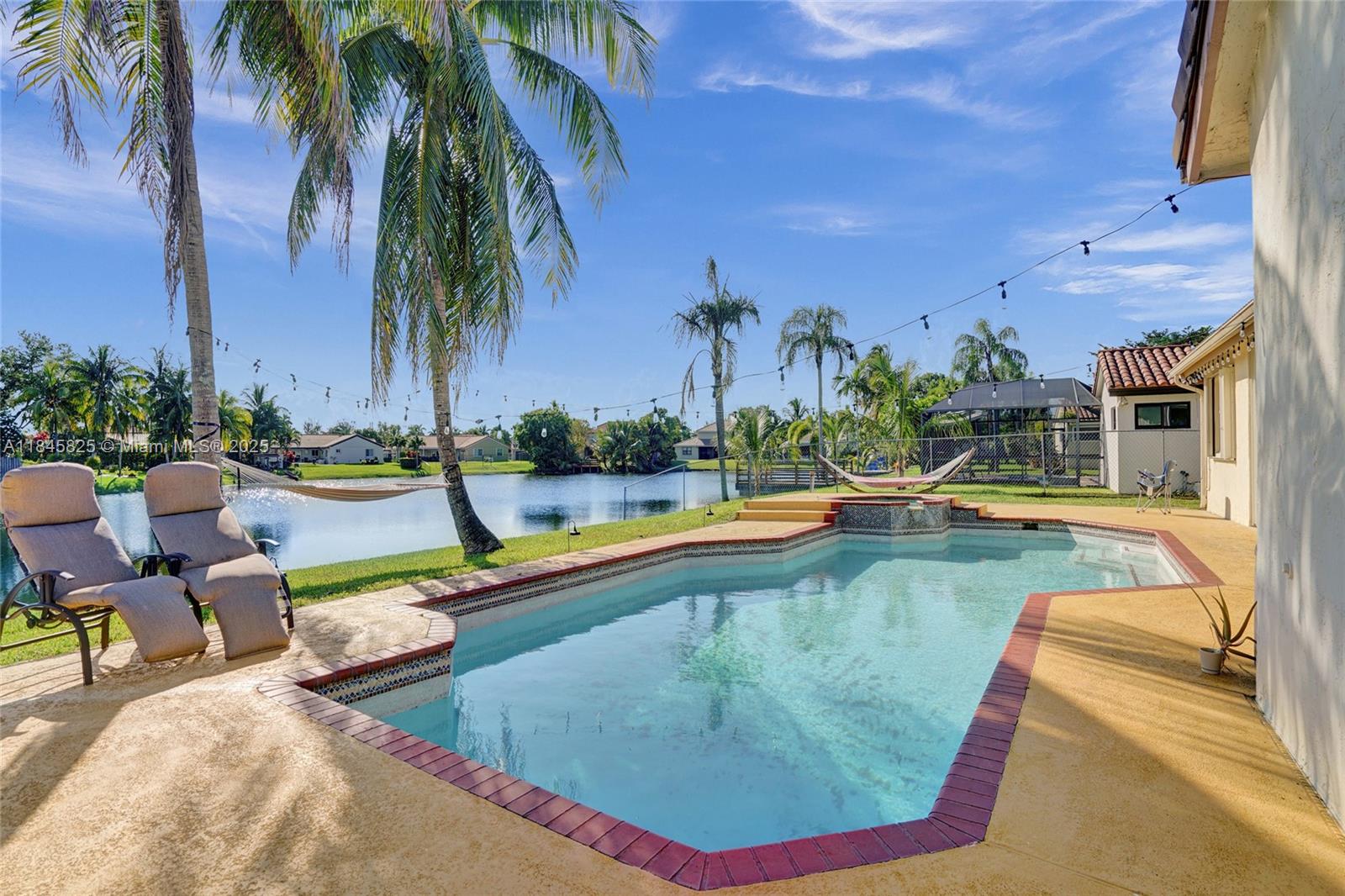Lakefront living in this beautifully maintained 4-bedroom, 3.5-bath single-story home with a private pool & spa in the desirable Hawkes Bluff community. It features a bright, open floor plan with Tile/Vinyl floor and freshly painted interiors with new recessed lighting. The oversized primary suite offers two full bathrooms and large walk-in closets, providing comfort & privacy. Enjoy peaceful 360° lake views from your backyard oasis, complete with a sparkling Pool & Spa - ideal for relaxing or entertaining. Additional features include accordion shutters, dual-zone A/C units, a 2-car garage & an extra refrigerator in the garage! Located close to top-rated schools, shopping, dining, and I-75 highway, this home offers both tranquility and accessibility.
Available for immediate move-in!
