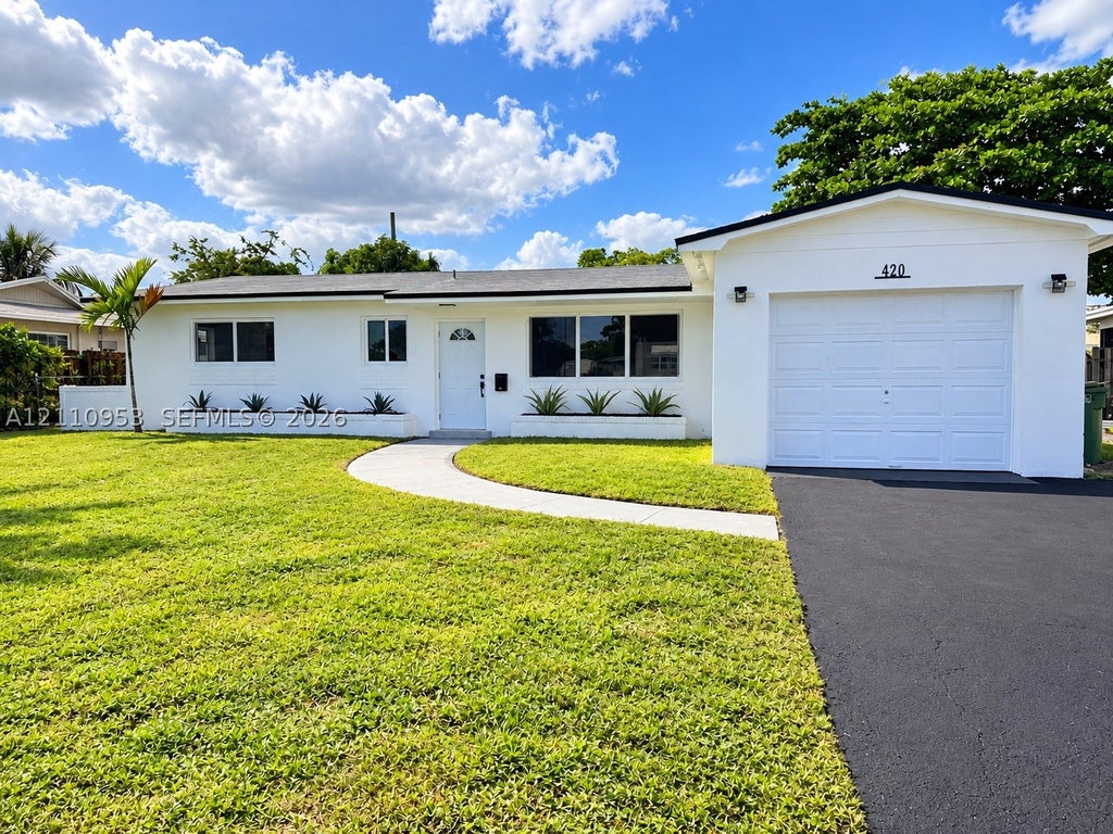 Photo of 420 SW 71st Way, Pembroke Pines, FL 33023 (MLS # A12110953)