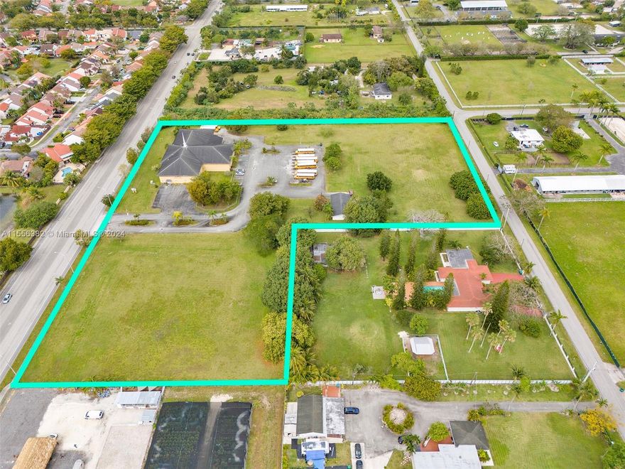 This is a property listing for a +/- 20,657 square foot freestanding building located on a gated lot measuring approximately 6.76 acres in the prestigious and exclusive Horse Country area. The folio number for the property is 30-4925-001-0010. The lot size is approximately 294,465.6 square feet. The property was built in 1995 and includes a +/- 1,500 square foot house. There are entrances from both 127th and 125th streets. The primary zoning code is 8900 Interim-Await Specific Zoning, and the primary land use is 7144 Religious. The property also offers ample parking.