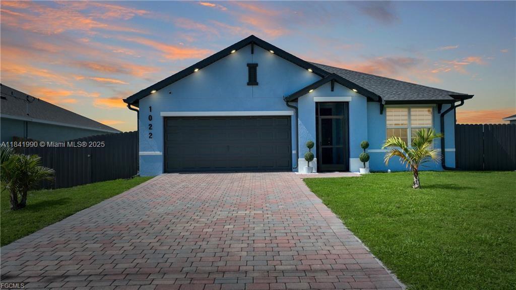 Welcome to this fully upgraded ARIA model located in a highly desirable area of NW Cape Coral. This 3-bedroom, 2-bath home offers built with high-end finishes including quartz countertops, stainless steel appliances, 18" tile flooring, a smart-home package, and a paver driveway. Recent upgrades include a new roof installed in 2022, new laminate flooring in all bedrooms, modern metal fencing enclosing the yard, a permitted private exterior door added to the guest bedroom, updated kitchen sink and zebra-style blinds throughout, full gutter system, fresh interior and exterior paint, and a screened-in front porch and lanai. The home also features a sprinkler system, serviced septic tank, and a solar panel system with one transferable/removable set.