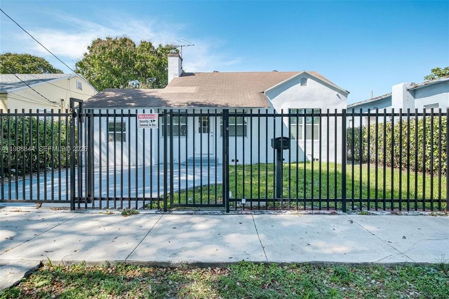 Beautifully updated 3-bedroom, 2-bathroom home in the highly sought-after Buena Vista neighborhood, just minutes from the Design District, Midtown and Wynwood. This gated property offers exceptional privacy and security with fencing in the front and back, plus a rare oversized yard with alley access, separate rear gate and plenty of room for a boat or additional parking. The updated interior features impact windows, a bright functional layout and spacious living spaces. The expansive backyard offers endless potential for entertaining, expansion, or adding a pool. A move-in ready opportunity in one of Miami’s most desirable and rapidly growing neighborhoods.