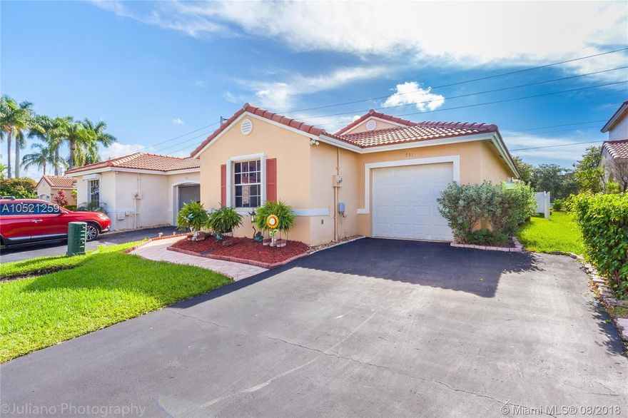 Beautiful 3/2 single story home. It features gorgeous new updated granite kitchen with 42' wood cabinets, pantry, and stainless steel appliances. New 18x18 tile floor through out and new wide baseboards. Freshly painted with pastel colors.Updated master bathroom with glass shower. Master bedroom w/his and hers closets. Recessing lights, high ceilings. 3 year old roof, accordion shutters, screened in patio and fenced backyard.  Beautiful patio GREAT for entertaining.The very best of South Florida living!!!