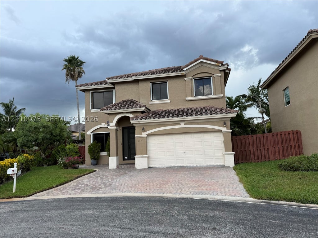Photo of 2030 NW 99th Ter, Pembroke Pines, FL 33024 (MLS # A12110975)