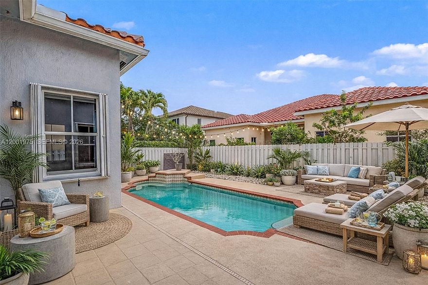 Breathtaking pool home in the prestigious gated community of Nautica in Miramar! This stunning one-story ranch-style residence offers fantastic curb appeal and a welcoming front entry into a beautifully designed interior with dramatic high ceilings and elegant crown molding throughout.The home features a spacious and functional layout, including a formal living room, dining room, and family room—perfect for both everyday living and entertaining. The open kitchen is equipped with stainless steel appliances, granite countertops, and ample cabinetry, seamlessly connecting to the main living areas.Enjoy neutral tile flooring in the main areas and rich hardwood floors throughout the home. The interior has been freshly painted, creating a bright and inviting atmosphere enhanced by large sliding glass doors that flood the space with natural light.The grand primary suite offers a true retreat with tray ceilings, dual walk-in closets, and a beautifully updated spa-like bathroom. All bathrooms in the home have been tastefully renovated.Step outside to your private backyard oasis featuring a resort-style pool—ideal for relaxing or entertaining. Located in a highly desirable community offering resort-style amenities, including a clubhouse, gym, tennis courts, basketball courts, library, and playgrounds, all within a 24-hour guard-gated neighborhood.Conveniently close to parks, shopping, major highways, hospitals, & top-rated schools.
True Gem don’t miss this exceptional opportunity!