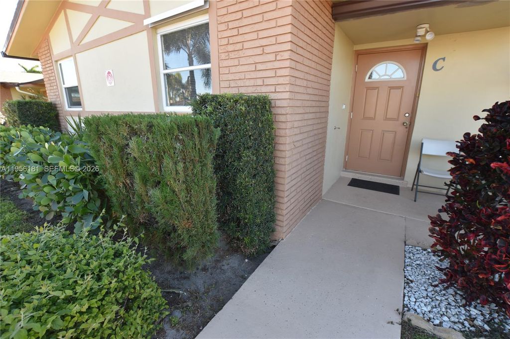 Photo of 2832 W Crosley Dr #C, West Palm Beach, FL 33415 (MLS # A11956181)