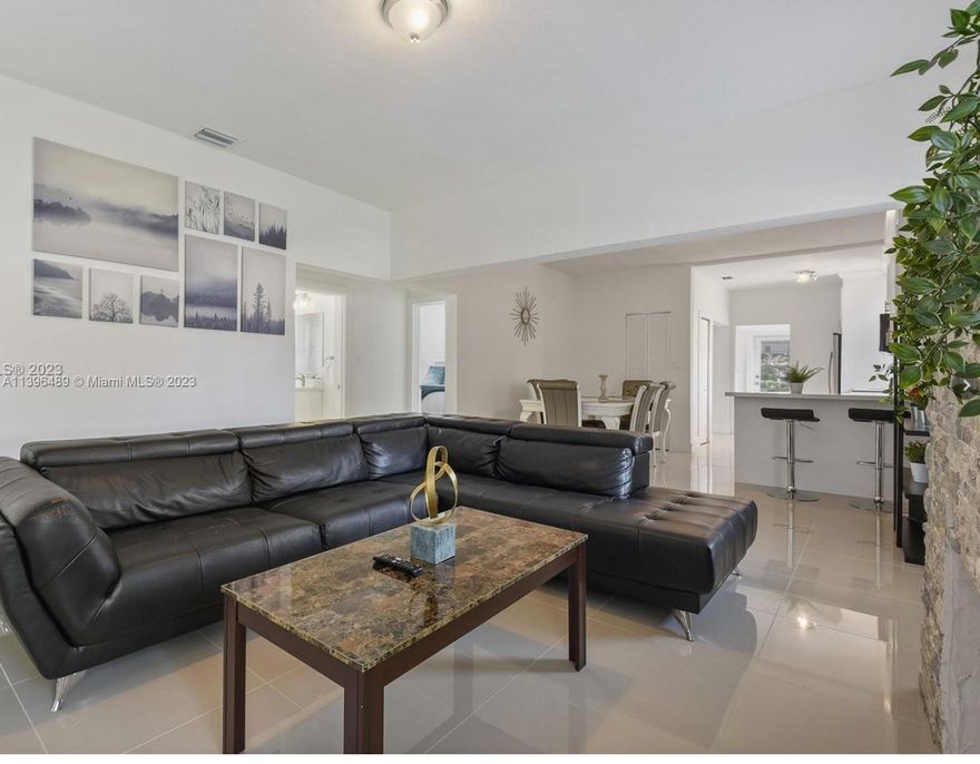 Imagine yourself with your loved ones, in the tranquility of your private sanctuary in this newly renovated home. Just minutes away from the popular New Miami Design District, South Beach, Wynwood, Downtown Miami, close to trending restaurants and stores, great location. This fully furnished home features 4 bedrooms and 2 bathrooms, with the added bonus of a detached in-law quarters that's also been beautifully remodeled and furnished. With tiled floors throughout the entire home, updated bathrooms, a remodeled kitchen complete with brand-new stainless-steel appliances, impact-resistant windows and doors, washer and dryer, parking for multiple vehicles, outdoor patio, and easy access to highways and top attractions, this home has everything you need to move in and start living.