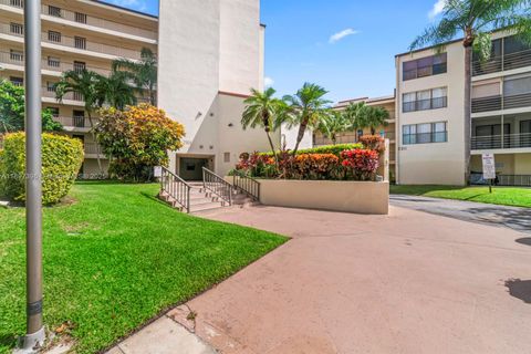 Photo of 2311 S Cypress Bend Dr #217A, Pompano Beach, FL 33069 (MLS # A11897396)
