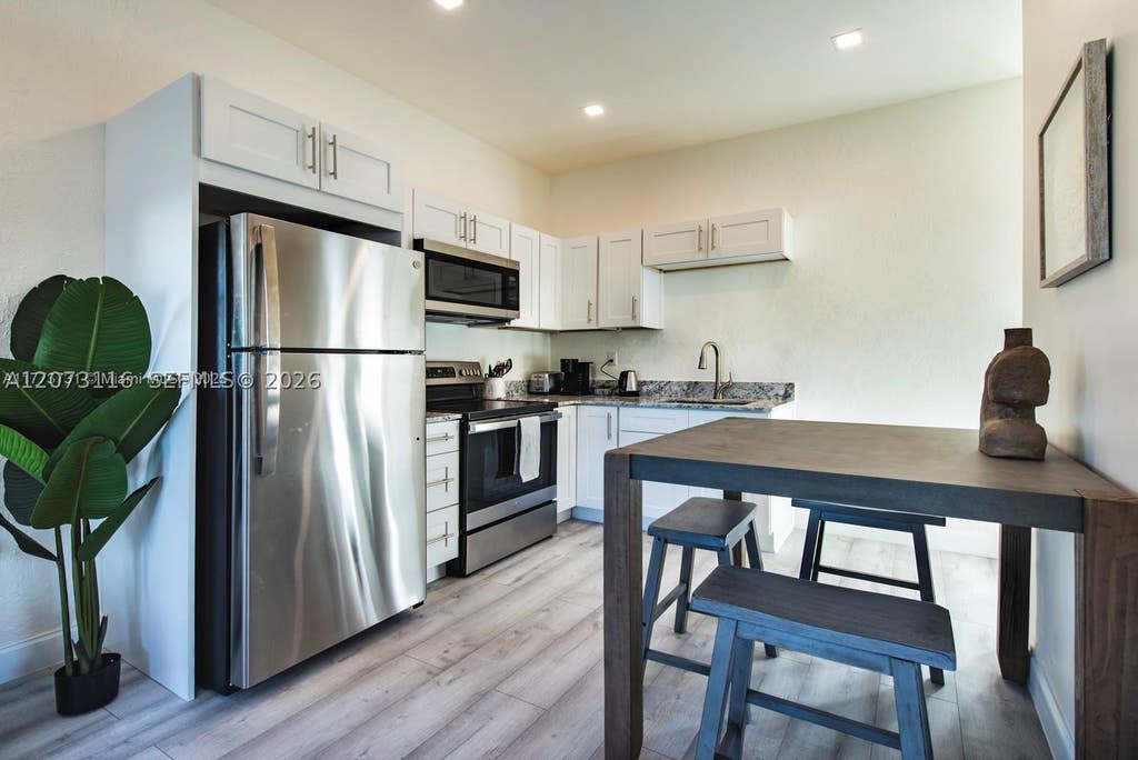 Photo of 115 SE 2nd St #2, Hallandale Beach, FL 33009 (MLS # A12073116)