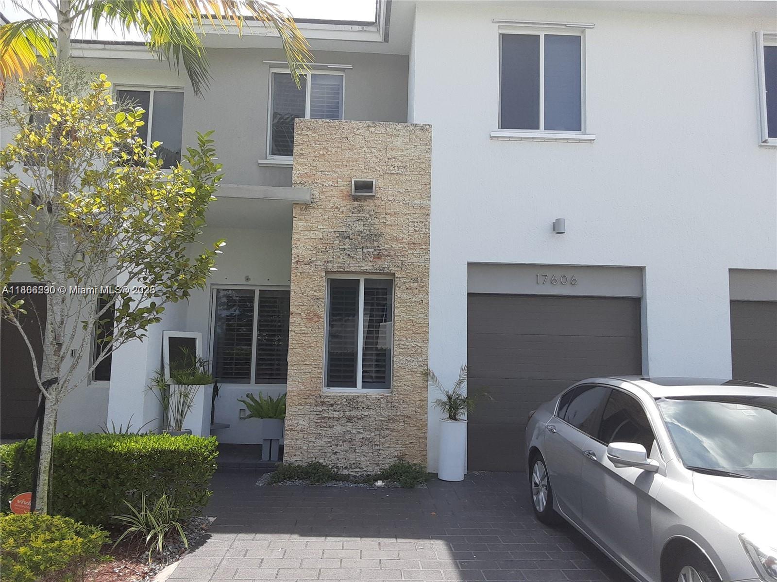 Stylish townhouse unit boasting 1,979 sqft of open spaces and outdoor entertaining spaces. Enter through the front door to find a freshly painted comfortable modern living spaces, sleek tile flooring, and a seamless flow out to the back patio area. Entertain with ease in the gourmet kitchen equipped with stainless steel appliances, stunning quartz countertops and the breakfast bar island. This unit has a total of 3 parking spaces, one inside the garage and two in front. Rent includes a new washer and a dryer inside the unit. Amenities include Clubhouse, pool, exercise room, landscape of common areas, garbage and recycle pick-up and security patrol.