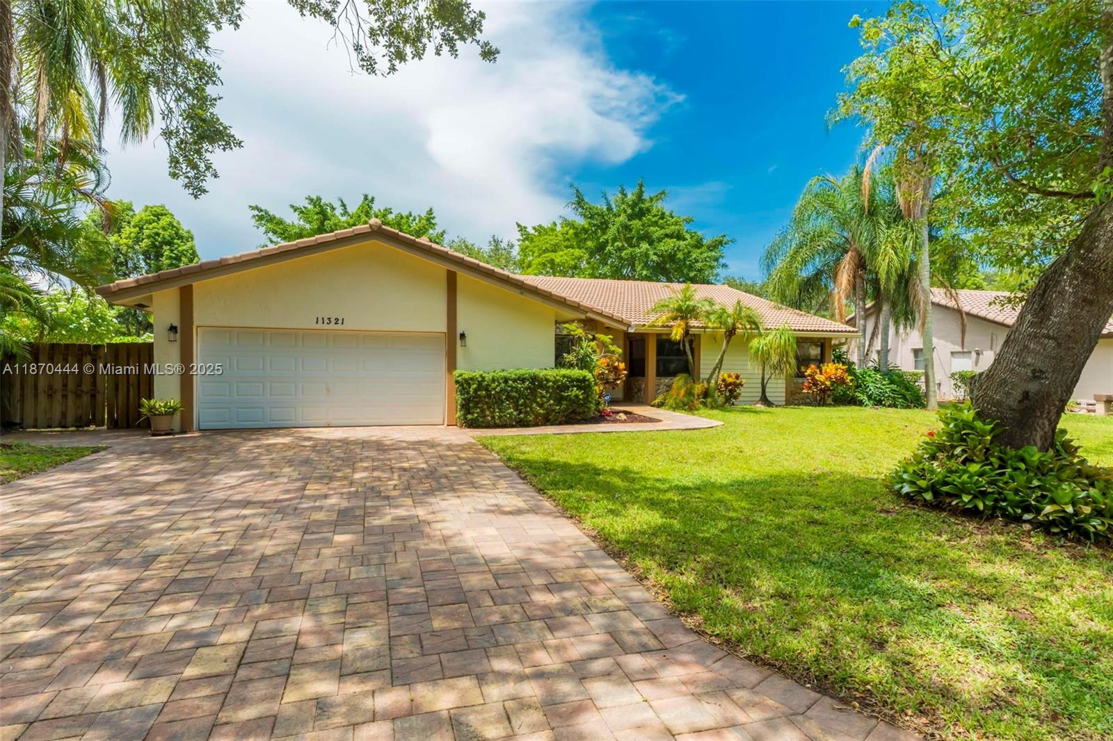 Stunning 4-Bedroom Home with Saltwater Pool – No HOA! Updated single-story 4-bed, 2.5-bath home in Coral Springs with 2,228 sq. ft. of open living space, vaulted ceilings, and tile flooring throughout. The gourmet kitchen features custom wood cabinetry, quartzite counters and backsplash, stainless appliances, and a 9-ft island with induction cooktop. Impact windows, accordion shutters, and a whole-house surge protector offer security and efficiency. Window blinds throughout for added privacy. Enjoy a fenced yard with fruit trees, travertine patio, and a resurfaced 15x30 saltwater pool with new pump and LED lights, perfect for entertaining. Walk to a top-rated elementary school. No HOA, enjoy the freedom! Schedule your showing today!
