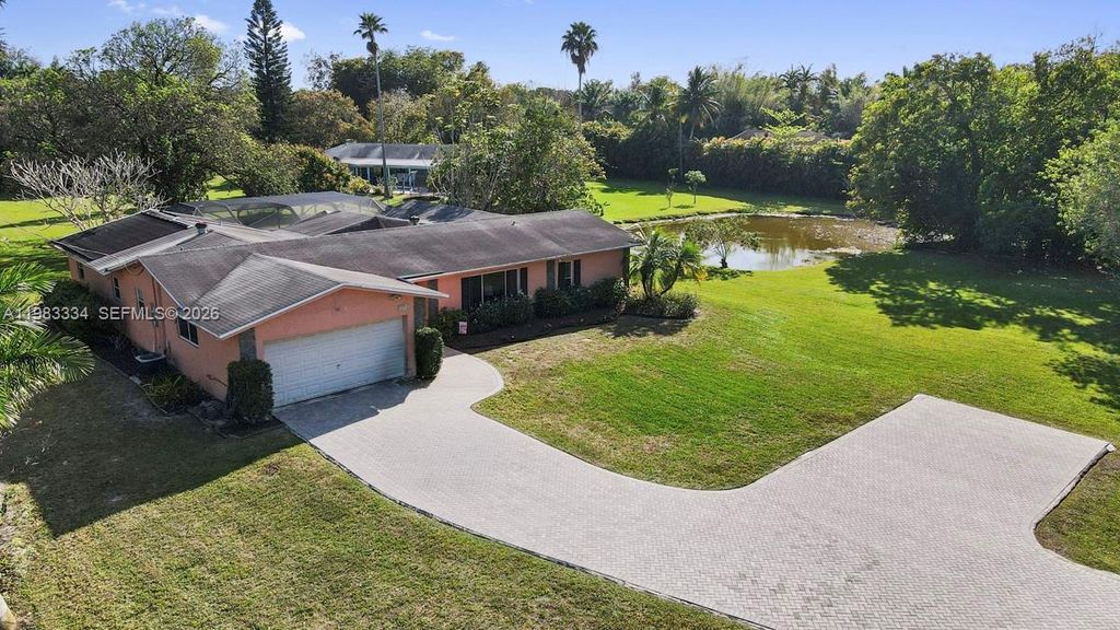 Photo of 10930 SW 27th Ct, Davie, FL 33328 (MLS # A11983334)