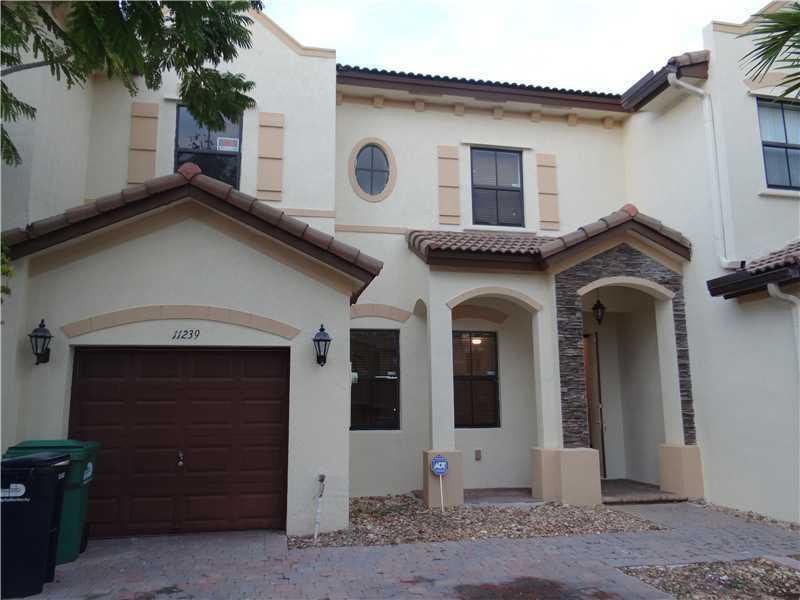 VERY SPACIOUS 2-STORY,3/2.5 TOWNHOUSE WITH ONE CAR GARAGE WITH ELECTRIC DOOR,NEW APPLIANCES, WASHER AND DRYER INSIDE THE UNIT. NEW WOOD FLOOR ON BEDROOMS, TILE ON FIRST FLOOR COMMUNITY LOCATED NEAR TURNPIKE,SHOPPING AND SCHOOLS,RESORT STYLE CLUBHOUSE WITH A LARGE SWIMMING POOL AND EXERCISE ROOM